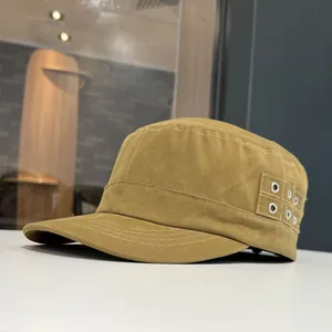Detail view of cotton flat-top military cap featuring side metal eyelets and twill texture