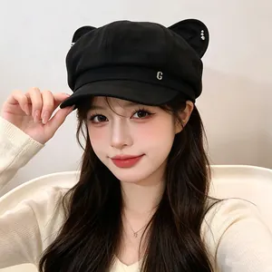 Fashionable black newsboy cap with cat ears and metallic G detail for women