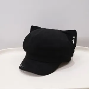 Black vintage denim newsboy hat featuring cute fox ears and a decorative silver key charm