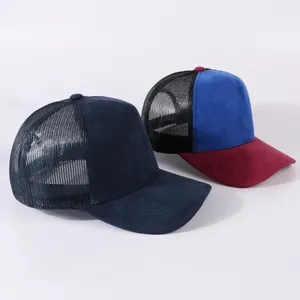 Two stylish faux suede mesh trucker hats in navy and color-block designs