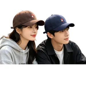 Unisex Korean style soft top baseball caps with red embroidered logo for couples