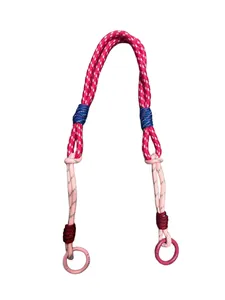 Close-up detail of the durable braided texture and pink engraved rings on the strap