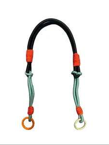 Detail view of a multi-color braided outdoor lanyard with orange and off-white rings.