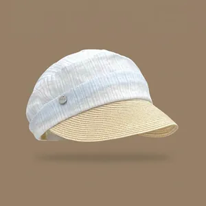Stylish pleated straw sun hat with light blue striped crown and wide beige brim for summer.