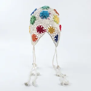 Colorful handmade Bohemian floral crochet hollow beanie with long tassels and pom-poms