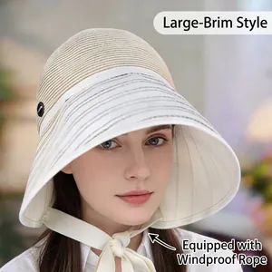 Fashionable wide brim straw sun hat for women with windproof chin strap for travel