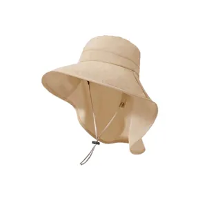 Wide brim sun hat with neck flap and adjustable chin strap in beige for women.