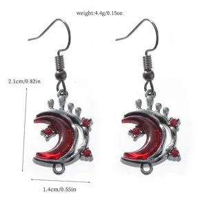 Detailed view and dimensions of gothic crescent moon drop earrings with red resin inlay