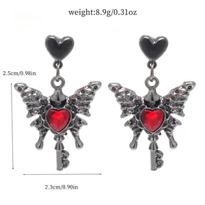 Gothic butterfly earrings with red heart gemstone and key dangle, 2.5cm height.