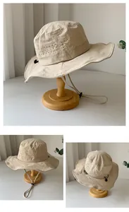 Detailed views of a beige breathable quick-dry sun hat with an adjustable chin cord