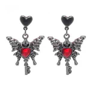Gothic butterfly drop earrings with red heart gemstone and vintage key pendant