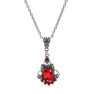 Élégant collier de style victorien vintage avec un grand pendentif ovale en rubis rouge