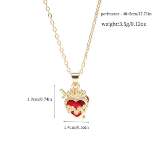 Detailed macro view showing dimensions of the gold heart pendant with rose accents