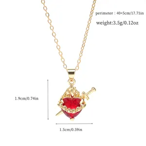 Detailed measurements for gold heart necklace featuring a unique flame and sword pendant