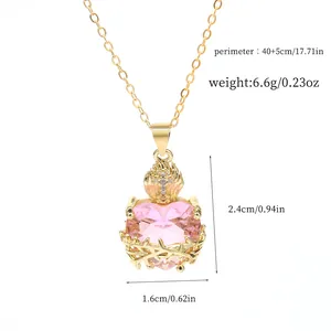 Detail view showing dimensions of pink heart pendant necklace with crown and thorns.