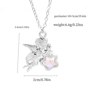 Detailed view of silver angel pendant necklace with pink star and size measurements