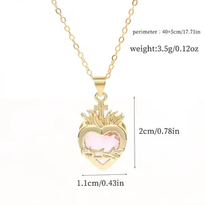 Detail view of gold sacred heart necklace with measurements and weight data