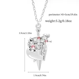 Detailed view of silver heart and sword necklace with pink rhinestones and product dimensions