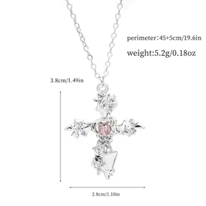 Silver cross necklace dimensions with pink heart stone and intricate floral details