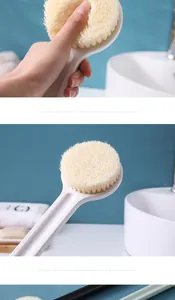 Detail showing the soft, dense bristles and ergonomic long ABS handle of the bath brush