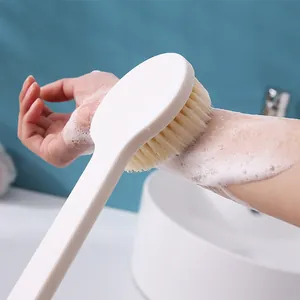 Long-handled bath brush with soft bristles for gentle back exfoliation