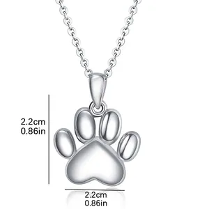 Detailed view of silver stainless steel pet paw urn pendant showing 2.2cm dimension.