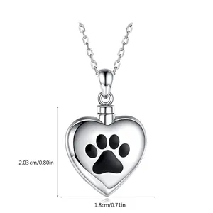 Heart-shaped stainless steel pet urn necklace with black paw print and detailed dimensions