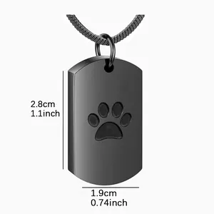 Black paw print cremation urn necklace for pets with dimensions 2.8x1.9 cm indicated.