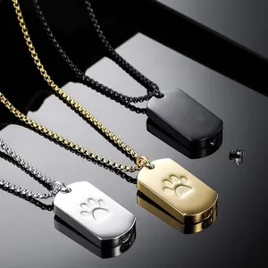 Set of three memorial urn necklaces in silver gold and black with paw prints detail