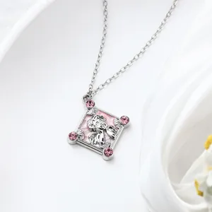 Detail view of sweet pink angel pendant necklace with crystals