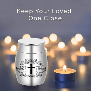 Small silver aluminum urn with cross and dove engraving for pet memorials