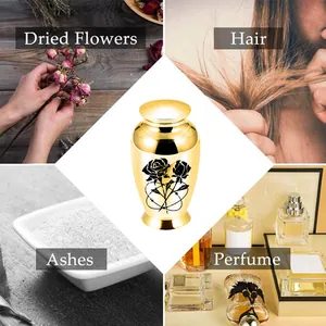 Golden alloy cremation urn with rose engraving for ashes, hair, and dried flowers