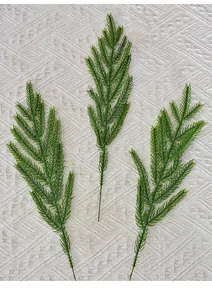 Close-up detail of soft rubber Norfolk pine sprigs used for Christmas decorations.