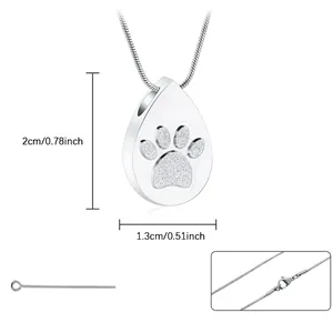 Detailed view of teardrop pet urn necklace with paw print design and dimensions