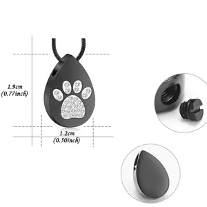Detailed product view of the teardrop paw print cremation urn necklace with size dimensions