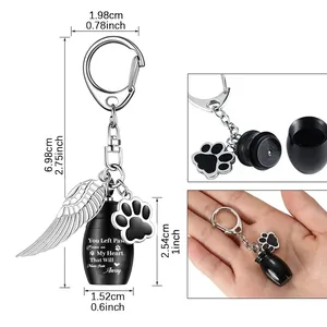 Memorial pet cremation urn keychain with angel wing and paw charms, 2.75 inch length