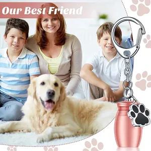 Rose gold pet cremation urn keychain for ashes and fur with paw print charm memorial