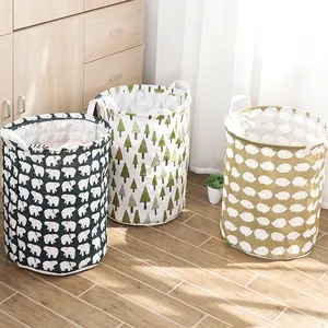Set of 3 foldable fabric laundry baskets with bear, pine tree, and hedgehog patterns
