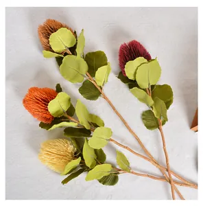 Detailed view of artificial Banksia flowers in autumn colors for Nordic home decor