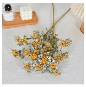 Close-up of vintage autumn artificial berries with dusty lace effect for home decor