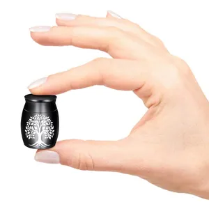 Miniature black aluminum alloy cremation urn with tree of life design for pet memorial ashes