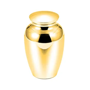 Elegant polished golden cremation urn for human or pet memorial ashes container