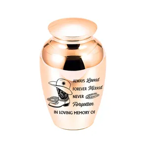 Detailed view of elegant rose gold cremation urn with cowboy themed memorial engraving design