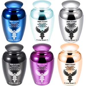 Set of six colorful small memorial urns featuring motorcycle wing designs for ashes