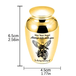 Detail of golden memorial keepsake urn with motorcycle angel engraving and dimensions