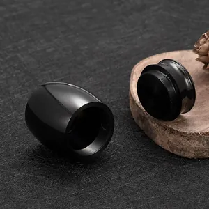 Small black aluminum keepsake cremation urn for ashes with secure screw top lid.