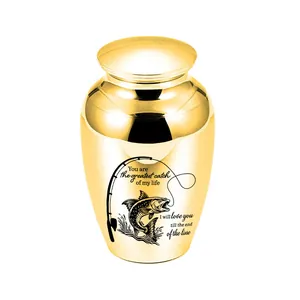 Macro view of the fishing theme engraving on a gold polished memorial cremation urn
