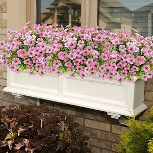 Realistische künstliche rosa Veilchenbündel in einem weißen Blumenkasten für den Garten