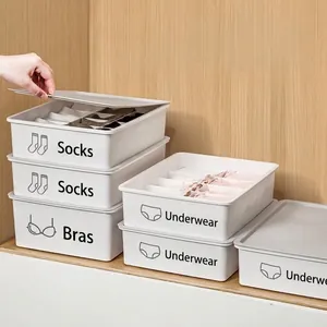 Stackable white underwear storage boxes with dustproof lids and compartments for socks