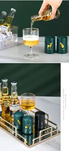 Creative press-type beer bottle openers in a luxury bar setting with gold accents
